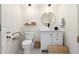 Cozy powder room featuring modern fixtures, patterned tile floor, and stylish decor at 5771 W Gail Dr, Chandler, AZ 85226