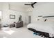 Bedroom featuring sitting area, bed, and natural light at 5771 W Gail Dr, Chandler, AZ 85226