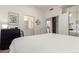 Serene main bedroom with bright white accents and ensuite bathroom access at 5771 W Gail Dr, Chandler, AZ 85226