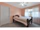 Comfortable bedroom featuring natural light, neutral carpet, and ceiling fan at 6993 S Sharon Ct, Chandler, AZ 85249