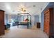 Spacious bedroom with four poster bed, carpet, and natural light from the window at 6993 S Sharon Ct, Chandler, AZ 85249