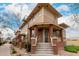 Inviting townhome with a brick-accented porch and a well-maintained front yard, promising comfort and style at 702 S Beck Ave, Tempe, AZ 85281