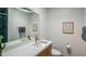 Clean bathroom with modern sink, quartz countertop and silver faucet at 7315 E Northland Dr # 8, Scottsdale, AZ 85251