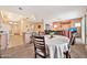 Open concept living area with view of the dining area and a peek into the kitchen at 7401 W Arrowhead Clubhouse Dr # 2012, Glendale, AZ 85308