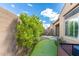 This backyard has a putting green, lush landscaping and a water feature at 7518 E Vista Bonita Dr, Scottsdale, AZ 85255