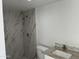 A new bathroom with a stand-up shower and a tiled floor at 824 S 3Rd Ave, Phoenix, AZ 85003