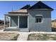 Charming exterior view of a well-maintained, two-story home with a covered porch and stylish architectural details at 824 S 3Rd Ave, Phoenix, AZ 85003