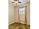 This bedroom features wood flooring and is illuminated by a natural light source from the window at 8386 E Arroyo Seco Rd, Scottsdale, AZ 85266