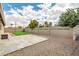 Large backyard featuring gravel and a concrete patio with mature trees at 8637 E Jackrabbit Rd, Scottsdale, AZ 85250