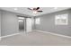 Empty bedroom featuring recessed lights and a modern ceiling fan and a view of the bathroom at 8637 E Jackrabbit Rd, Scottsdale, AZ 85250