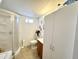 Bathroom featuring corner shower with a stacked washer and dryer at 864 S Motherlode Dr, Apache Junction, AZ 85119