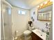 Compact bathroom features a corner shower and vanity at 864 S Motherlode Dr, Apache Junction, AZ 85119