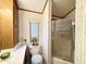 The bathroom area includes a shower with glass door and wood accents at 864 S Motherlode Dr, Apache Junction, AZ 85119