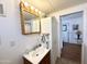 Bathroom featuring corner shower, small window, and vanity at 864 S Motherlode Dr, Apache Junction, AZ 85119