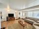 Comfortable living room showcasing wood flooring and a neutral color palette, perfect for relaxation at 864 S Motherlode Dr, Apache Junction, AZ 85119