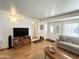 Comfortable living room showcasing wood flooring and a neutral color palette at 864 S Motherlode Dr, Apache Junction, AZ 85119