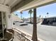 Quiet street with single-story homes and palm trees at 864 S Motherlode Dr, Apache Junction, AZ 85119