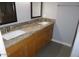 Granite countertops and dual sinks add luxury to this bathroom at 925 W Mcdowell Rd # 102, Phoenix, AZ 85007