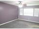 Spacious bedroom with three windows and a ceiling fan at 925 W Mcdowell Rd # 102, Phoenix, AZ 85007