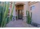 Close up of the front entrance and walkway featuring desert landscaping and stone accents at 9431 N Summer Hill Blvd, Fountain Hills, AZ 85268