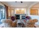 Inviting living room with a cozy fireplace and comfortable seating area at 9431 N Summer Hill Blvd, Fountain Hills, AZ 85268