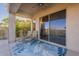 Relaxing covered patio with lounge chairs, an area rug, and beautiful natural light at 9431 N Summer Hill Blvd, Fountain Hills, AZ 85268