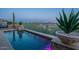 Backyard swimming pool with water features and desert landscaping at 9431 N Summer Hill Blvd, Fountain Hills, AZ 85268