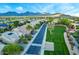 An aerial view of a charming neighborhood, showcasing manicured lawns and mountain views at 9727 E Presidio Rd, Scottsdale, AZ 85260