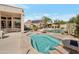 Beautiful pool and spa, offering a luxurious outdoor retreat with a lushly landscaped backyard oasis at 9727 E Presidio Rd, Scottsdale, AZ 85260