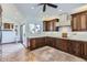 Gourmet kitchen featuring custom cabinets and modern appliances at 9803 N 100Th Pl, Scottsdale, AZ 85258