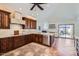 Spacious kitchen featuring custom cabinets and a large island at 9803 N 100Th Pl, Scottsdale, AZ 85258