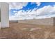 Large backyard with concrete block wall, ready for landscaping at 10308 E Utah Ave, Mesa, AZ 85212