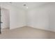 Neutral bedroom featuring carpet, white walls, and lots of natural light at 10308 E Utah Ave, Mesa, AZ 85212