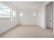 Bright bedroom with two windows at 10308 E Utah Ave, Mesa, AZ 85212