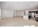 Open floor plan living room featuring modern kitchen with large island at 10308 E Utah Ave, Mesa, AZ 85212