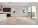 Bright living space with stainless steel appliances and sliding glass doors to patio at 10308 E Utah Ave, Mesa, AZ 85212