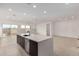 Bright open floor plan with kitchen island and large living space at 10308 E Utah Ave, Mesa, AZ 85212