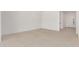 Bright, open living space with neutral tile floors at 10308 E Utah Ave, Mesa, AZ 85212