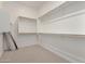 Spacious walk-in closet with built-in shelving and ample storage space at 10308 E Utah Ave, Mesa, AZ 85212