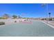 Half-court basketball with adjustable hoop and shaded seating in a well-maintained recreation area at 10730 W Escuda Dr, Peoria, AZ 85373