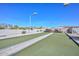 Enjoy a game of Bocce Ball on this well-maintained court with covered seating in this active adult community at 10730 W Escuda Dr, Peoria, AZ 85373