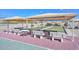 Community bocce ball courts with shaded seating areas for residents to enjoy at 10730 W Escuda Dr, Peoria, AZ 85373