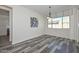 Dining area with window and neutral color palette at 10730 W Escuda Dr, Peoria, AZ 85373