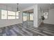Bright dining area with large window and sliding glass door to backyard patio at 10730 W Escuda Dr, Peoria, AZ 85373