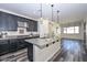 Spacious kitchen with granite countertops, stainless steel appliances, and an open design at 10730 W Escuda Dr, Peoria, AZ 85373