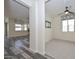Open-concept living room and bedroom with neutral colors at 10730 W Escuda Dr, Peoria, AZ 85373