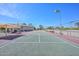 Tennis court complex featuring multiple courts with shade structures and fencing in an active adult community at 10730 W Escuda Dr, Peoria, AZ 85373