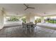 A community common area with covered seating, ceiling fans, and outdoor access at 11664 E Del Timbre Dr, Scottsdale, AZ 85259