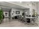 A spacious conference room has a large screen TV and comfortable seating at 11664 E Del Timbre Dr, Scottsdale, AZ 85259