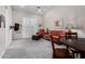 Living room with a vaulted ceiling, comfortable seating, and a flat-screen TV at 11664 E Del Timbre Dr, Scottsdale, AZ 85259